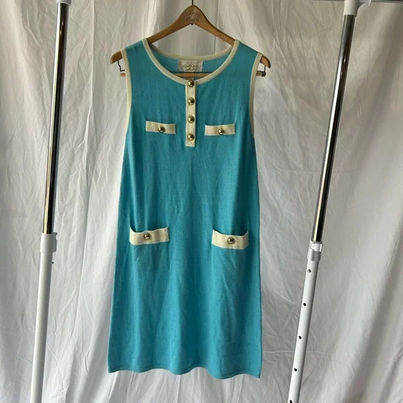 slim fit dress slacks Women's sweater-dress with high neckline and golden buttons main image 1